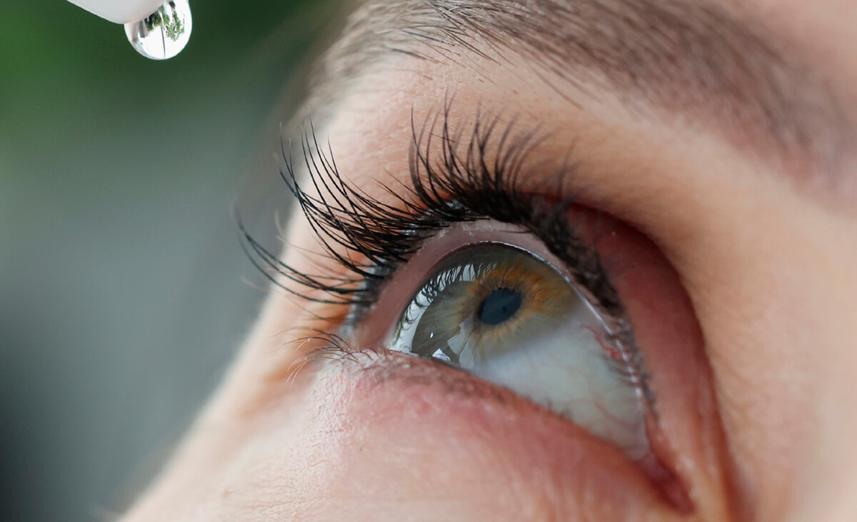 Eyedrops dropping in the eye